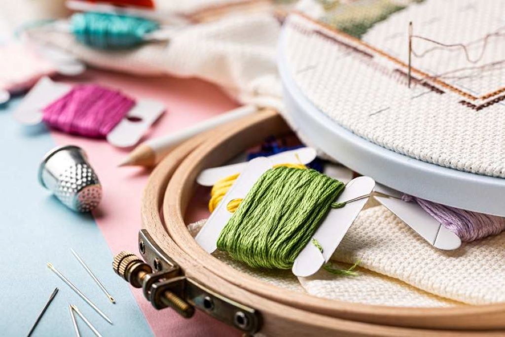Why is it important to know the tools used in embroidery